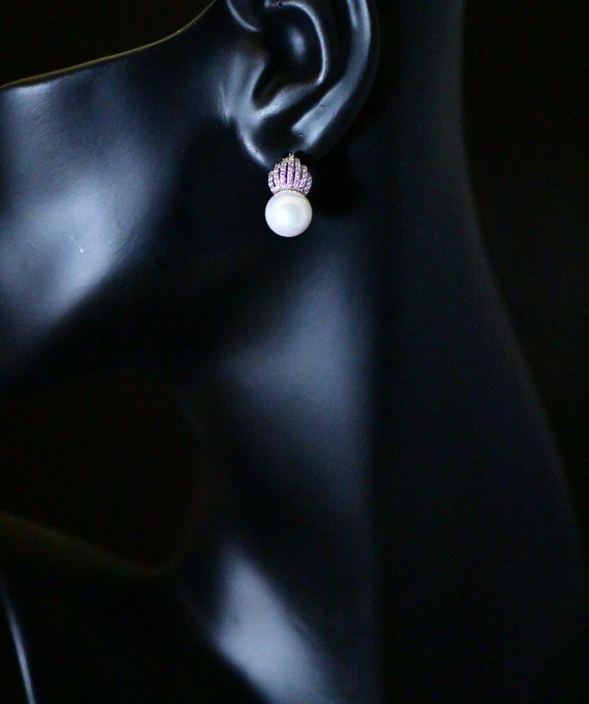 CROWNING ACHIEVEMENT -  Lovely pearl earring with a cubic zircon crown on top