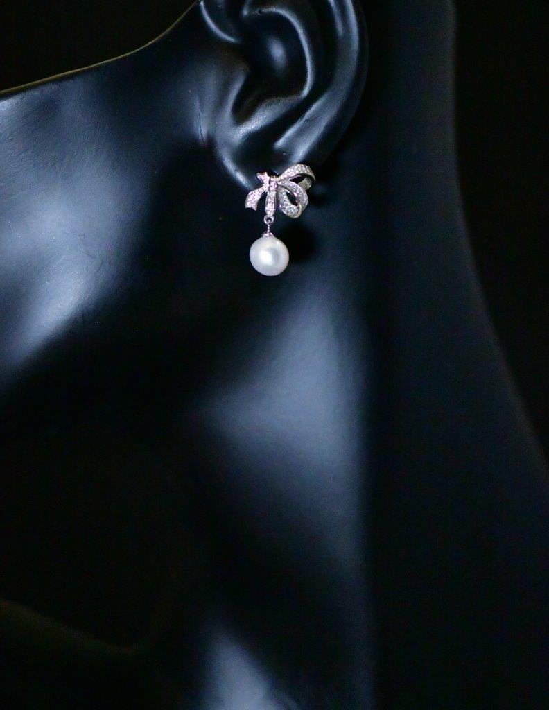 RADIANT BRIDE - Little bow sterling silver earring with baroque pearl