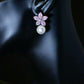 DOUBLE DELIGHT - Delightful Gold Plated Dangle Drop Pearl Earrings with Cubic Zirconia Flower