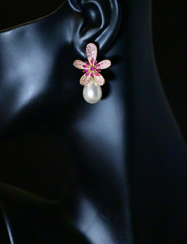 DELIGHTFUL DELILA -Geometric Red and purple Cubic Zirconia in a gold Flower with a Drop Pearl Earring