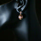 GLORIOUS GLOW  - 18ct real gold plated oval shaped earrings with a zircon fleur- de lis