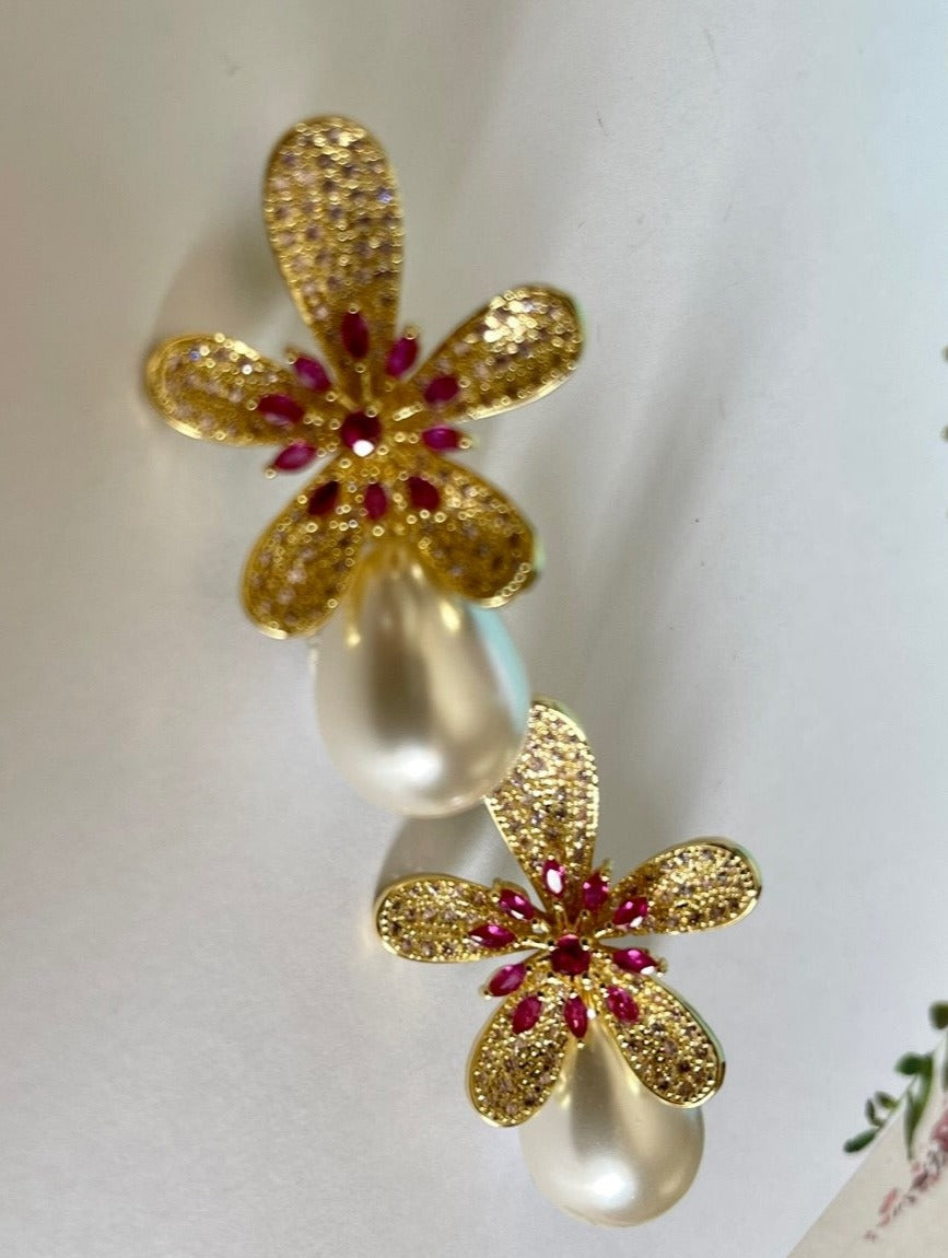 DELIGHTFUL DELILA -Geometric Red and purple Cubic Zirconia in a gold Flower with a Drop Pearl Earring