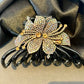 FLOWER BLING Bling flower hair claw in a medium size