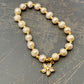 GLAMOUR STAR -Fresh water pearl bracelet with cubic and gold flower