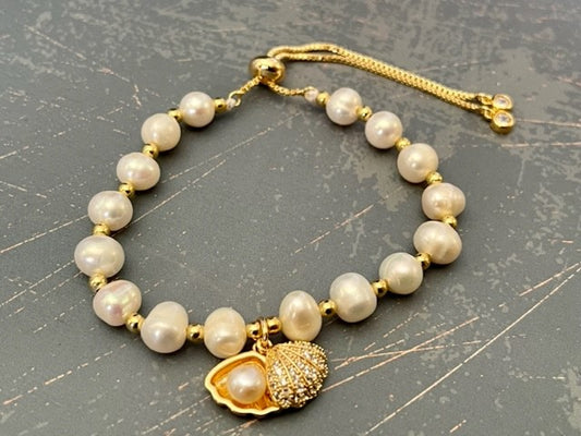 GOLDEN PEARL -Fresh water pearl and gold clam drawstring bracelet