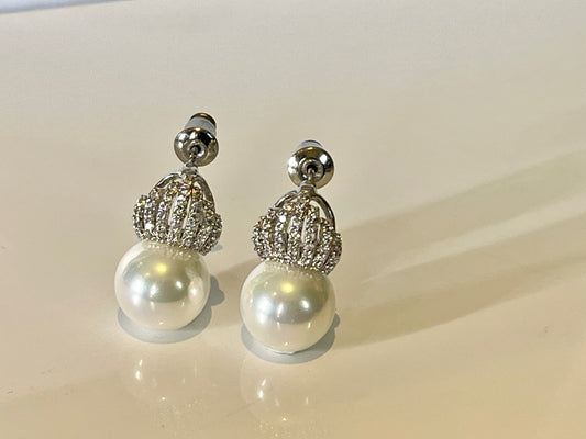 CROWNING ACHIEVEMENT -  Lovely pearl earring with a cubic zircon crown on top