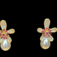 DELIGHTFUL DELILA -Geometric Red and purple Cubic Zirconia in a gold Flower with a Drop Pearl Earring